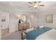 Comfortable main bedroom with a cozy seating area, stylish decor, and neutral tones at 6425 Rosetta Drive, Unit 65, South Fulton, GA 30331