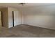 Spacious carpeted bedroom with dormer ceiling and ample natural light from the window at 893 Port West Dr, Auburn, GA 30011