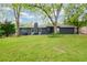 Sprawling backyard featuring a lush lawn and mature trees for shade and privacy at 126 N Barton St, Norcross, GA 30071