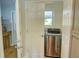 Convenient laundry room is ready with a stainless steel washer and dryer at 126 N Barton St, Norcross, GA 30071