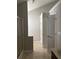 Bathroom with a shower, a toilet, and some doors at 4291 Preserve Trl, Snellville, GA 30039