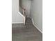 Carpeted staircase with white risers and dark wood handrail at 4291 Preserve Trl, Snellville, GA 30039