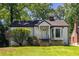 Charming single-story home with a welcoming front entrance and well-maintained landscaping at 536 Trabert Nw Ave, Atlanta, GA 30309