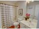 Cozy bathroom featuring a shower-tub combo with neutral tones and a classic vanity at 2557 Avery Park Cir, Atlanta, GA 30360