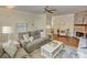 Cozy living room with comfortable seating, hardwood floors, and stylish decor at 2557 Avery Park Cir, Atlanta, GA 30360
