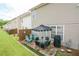 Outdoor patio area with comfortable seating, a dining set, and a well-maintained grill, perfect for entertaining at 2557 Avery Park Cir, Atlanta, GA 30360