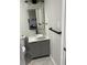 Modern bathroom featuring a vessel sink, vanity with gold accents, and stylish fixtures at 3009 Bruce Nw Ct, Acworth, GA 30101