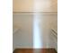 Organized closet space with shelves and a hanging rod, perfect for storage solutions at 3009 Bruce Nw Ct, Acworth, GA 30101