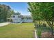Charming two story house with large yard, white porch and driveway at 3009 Bruce Nw Ct, Acworth, GA 30101