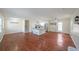Spacious open floor plan with hardwood floors, kitchen island, and ample natural light at 3009 Bruce Nw Ct, Acworth, GA 30101