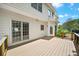 Large wooden deck with railing offers a great outdoor entertaining space at 5395 Fontenoy Ct, Peachtree Corners, GA 30071