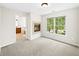 The bedroom features a cozy fireplace, bright windows, and ensuite bathroom access at 5395 Fontenoy Ct, Peachtree Corners, GA 30071