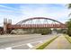 An inviting view of the Peachtree Corners bridge, set against a picturesque sky at 5395 Fontenoy Ct, Peachtree Corners, GA 30071