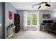 Comfortable bedroom with sports decor, large window, desk, and bookshelf at 2794 Kakki Ct, Marietta, GA 30062
