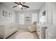 Cozy Bedroom with a crib, neutral color palette, and ample natural light at 2794 Kakki Ct, Marietta, GA 30062