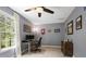 Comfortable bedroom with modern ceiling fan and a large window offering natural light at 2794 Kakki Ct, Marietta, GA 30062