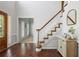 Bright entryway with hardwood floors, staircase, and stylish decor at 2794 Kakki Ct, Marietta, GA 30062