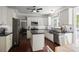 Spacious kitchen featuring white cabinetry, stainless steel appliances, dark countertops, and a functional island at 2794 Kakki Ct, Marietta, GA 30062