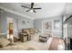 Spacious living room featuring hardwood floors, a fireplace, and comfortable seating at 2794 Kakki Ct, Marietta, GA 30062