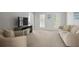 Cozy living room with plush carpet, neutral decor, and plenty of natural light at 2794 Kakki Ct, Marietta, GA 30062