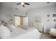 Light filled main bedroom featuring vaulted ceilings, barn door to bath, neutral decor, and ample closet space at 2794 Kakki Ct, Marietta, GA 30062