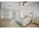 Tranquil main bedroom featuring vaulted ceiling, neutral colors, comfortable king bed, and ample natural light at 2794 Kakki Ct, Marietta, GA 30062