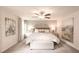 Serene main bedroom with a ceiling fan, soft lighting, and a comfortable, inviting atmosphere at 311 Wells Cir, Canton, GA 30114