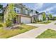 Charming street view showcasing the home's manicured lawn, driveway, and neighborhood setting at 311 Wells Cir, Canton, GA 30114