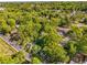 Neighborhood aerial view showcasing lush tree coverage and residential streets, offering a serene and nature-filled environment at 324 Pine Ne St, Marietta, GA 30060