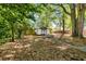 Backyard with charming shed, fire pit, and patio area at 324 Pine Ne St, Marietta, GA 30060