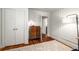 Bedroom with natural light, wood floors, walk-in closet and updated fixtures at 324 Pine Ne St, Marietta, GA 30060