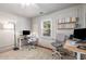 Bright home office with hardwood floors, neutral walls, and modern furnishings for a productive workspace at 324 Pine Ne St, Marietta, GA 30060