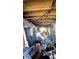 Unfinished basement with exposed ceiling, assorted boxes, and utilities at 4256 Village Square Ln, Stone Mountain, GA 30083