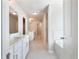 A primary bathroom with dual vanities, a glass shower, and a separate soaking tub at 632 Eagles Nest Cir, Auburn, GA 30011