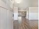Inviting foyer with hardwood floors, paneling and views into the living space at 632 Eagles Nest Cir, Auburn, GA 30011