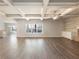 Spacious living room boasts coffered ceilings, recessed lighting, and hardwood floors at 632 Eagles Nest Cir, Auburn, GA 30011