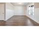 Bright and airy living room featuring hardwood floors and natural light at 632 Eagles Nest Cir, Auburn, GA 30011
