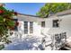 Sunny back deck with white railing and French doors, perfect for outdoor entertaining at 1421 Smith Se St, Atlanta, GA 30316