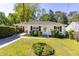 Charming single-story home with a well-manicured lawn and inviting front entrance at 1421 Smith Se St, Atlanta, GA 30316
