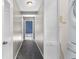 The hallway features a laundry closet with stacked washer and dryer at 1421 Smith Se St, Atlanta, GA 30316