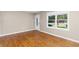 Inviting living room features hardwood floors, natural light, and a front door at 1421 Smith Se St, Atlanta, GA 30316