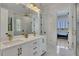 Modern bathroom with dual vanities, marble countertops, and a glass-enclosed shower at 247 Terrace View Dr, Acworth, GA 30101