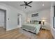 Serene bedroom with natural wood floors, complemented by neutral tones and soft lighting at 247 Terrace View Dr, Acworth, GA 30101