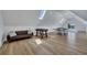 Finished bonus room with a foosball table, ping pong table, skylights, and hardwood floors at 247 Terrace View Dr, Acworth, GA 30101