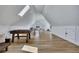 Finished bonus room with a foosball table, ping pong table, skylights, and hardwood floors at 247 Terrace View Dr, Acworth, GA 30101
