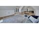 Finished bonus room with seating area, ping pong table, hardwood floors and lots of natural light at 247 Terrace View Dr, Acworth, GA 30101