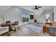 Sitting area in finished bonus room with hardwood floors, comfortable seating, and large window at 247 Terrace View Dr, Acworth, GA 30101