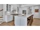 Bright kitchen with island seating, modern appliances, and ample storage space at 247 Terrace View Dr, Acworth, GA 30101