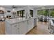 Spacious open concept featuring large island with breakfast bar and modern kitchen and dining area at 247 Terrace View Dr, Acworth, GA 30101
