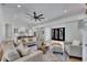 Spacious open-concept living room with large windows, modern lighting, and access to the backyard at 247 Terrace View Dr, Acworth, GA 30101